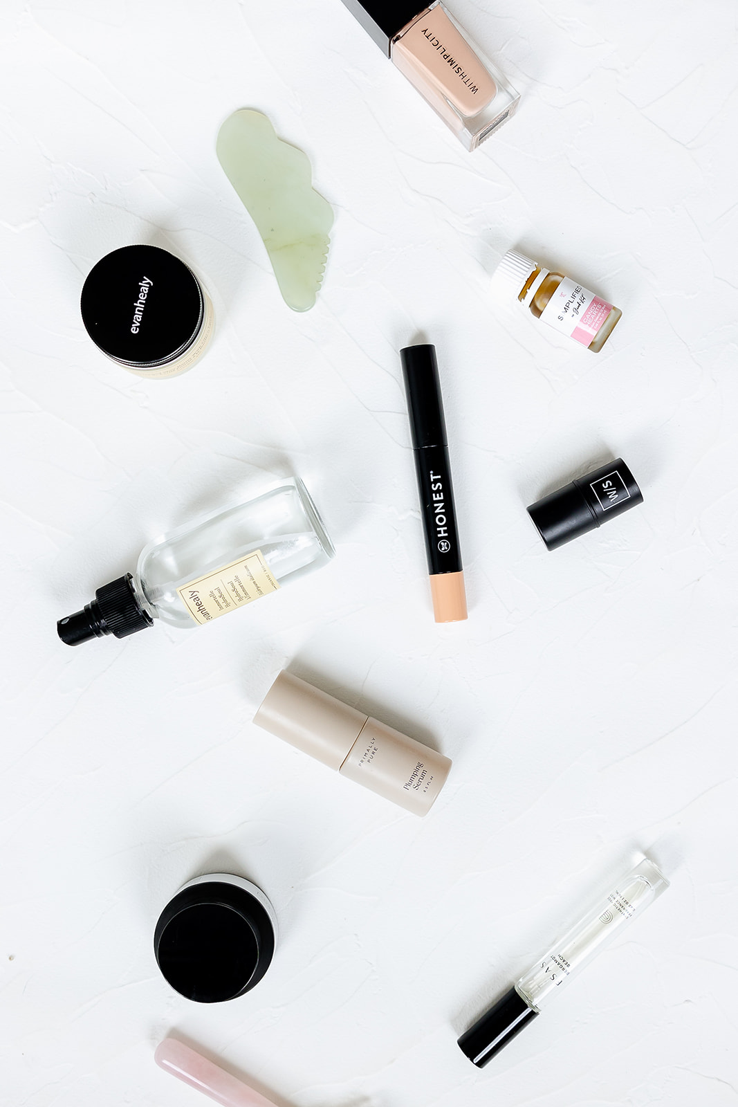 clean beauty products on a white background